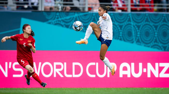 United States forward Alyssa Thompson jumps up to keep control of the ball against Vietnam at the Women’s World Cup.